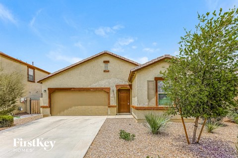 a house with a driveway and a garage door