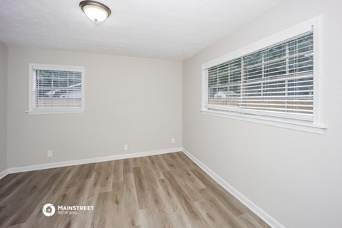 the spacious living room of our studio apartment at university heights affordable housing
