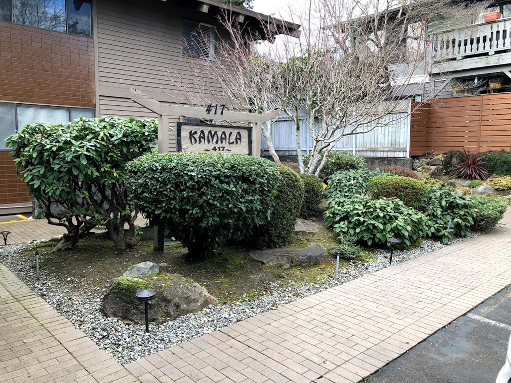 a small garden in front of a building