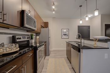 Fully equipped kitchen with stainless steel appliances