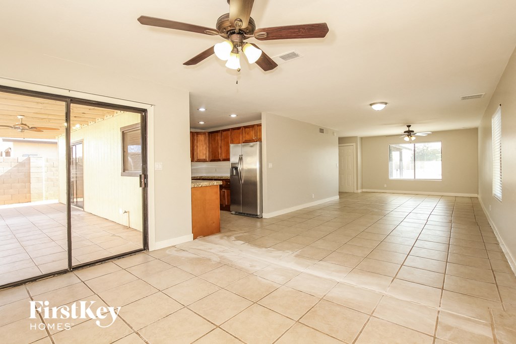 the kitchen is open to the dining room and living room