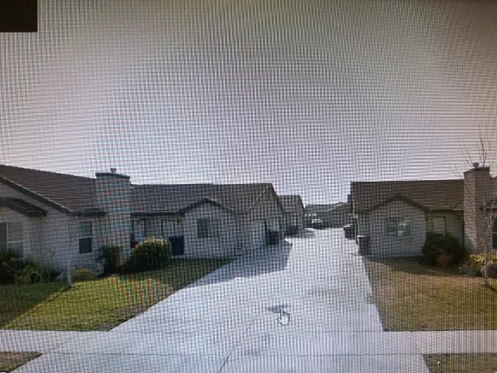 a view of houses from a screen