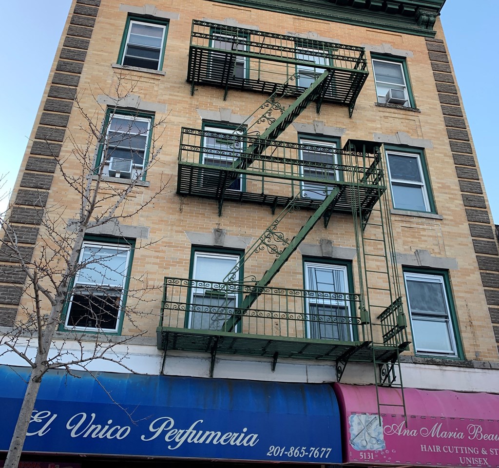 a building with a fire escape on the side of it
