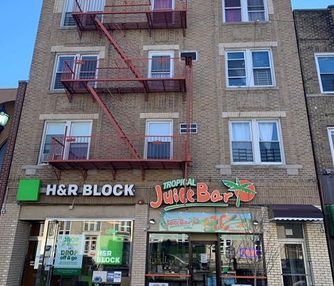 A building with a sign that says H&R Block.