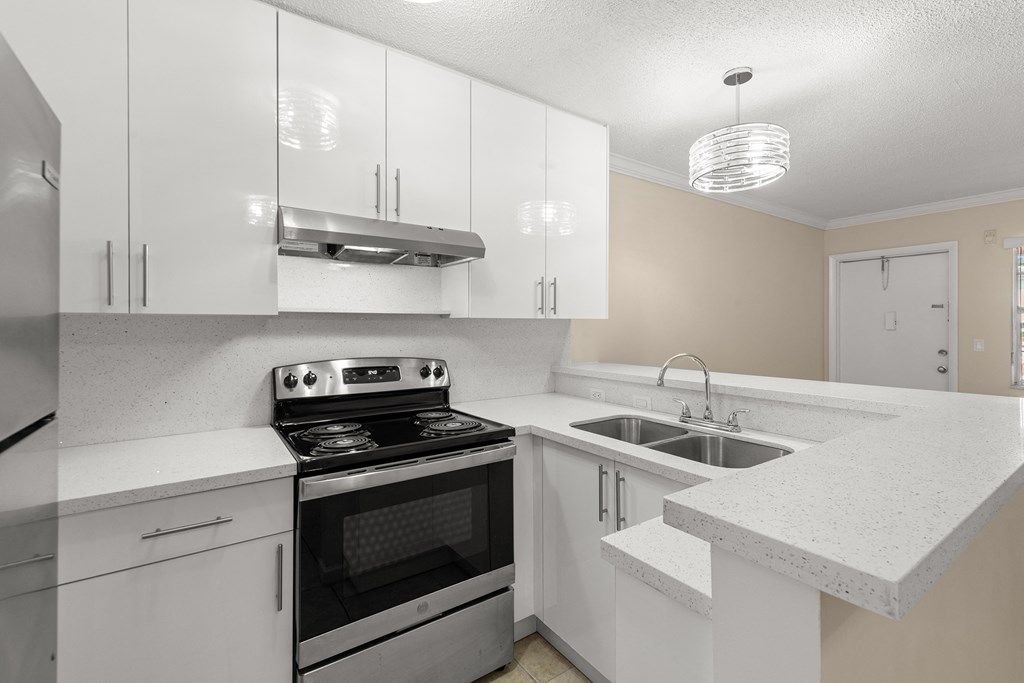 the preserve at ballantyne commons apartment kitchen with stainless steel appliances