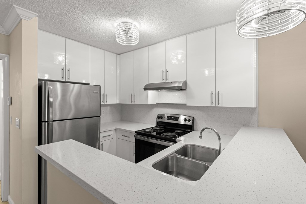the preserve at ballantyne commons apartment kitchen with stainless steel appliances