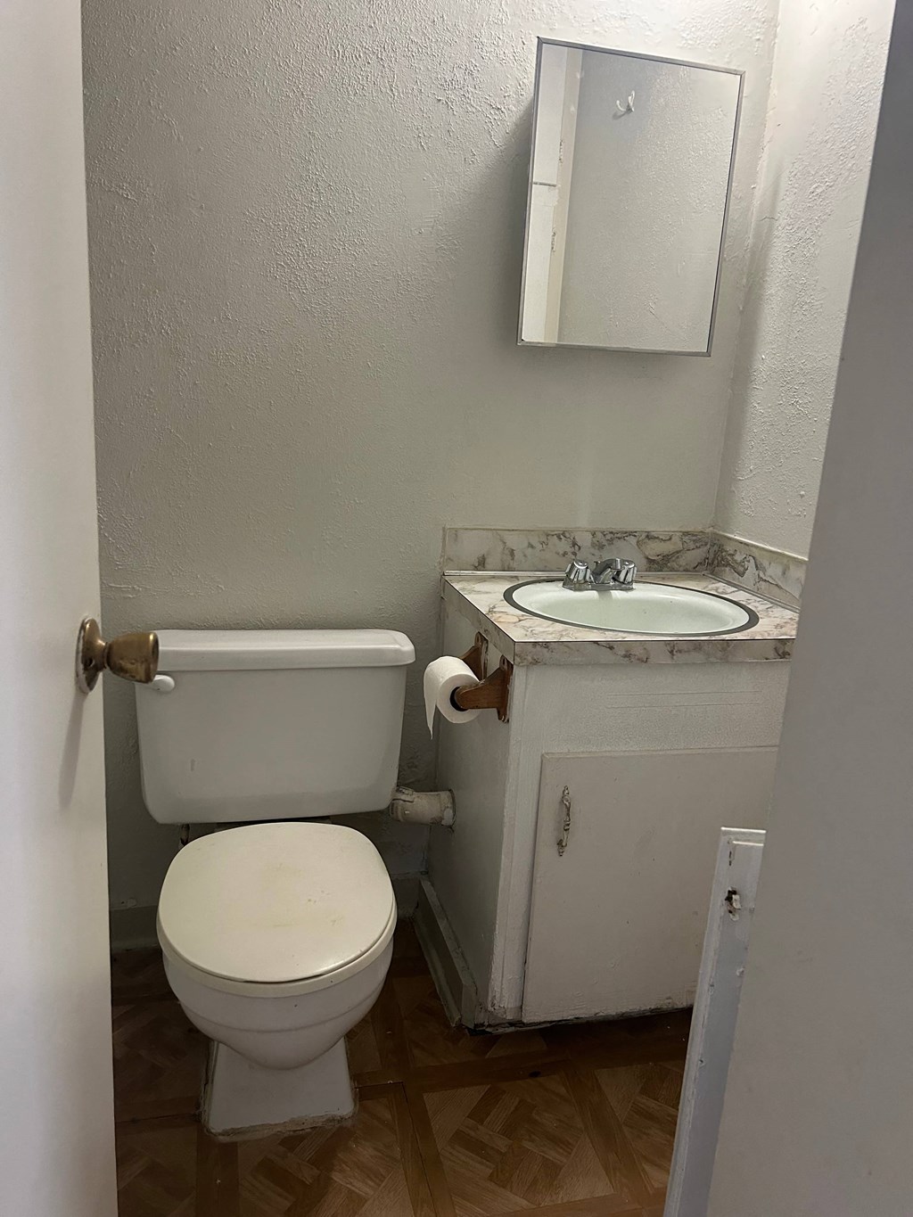a small bathroom with a toilet and a sink