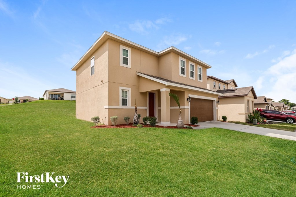 a house with a lawn in front of it