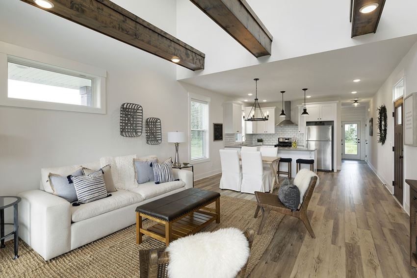 a living room with a couch and a table
