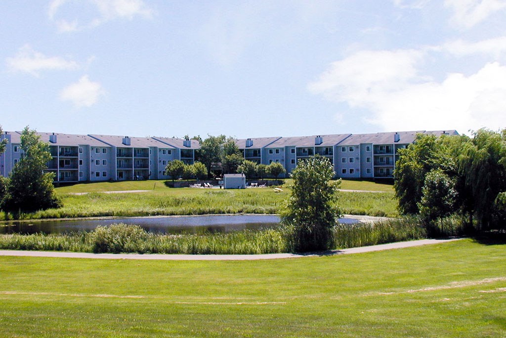 Outdoor View of property overlooking pond