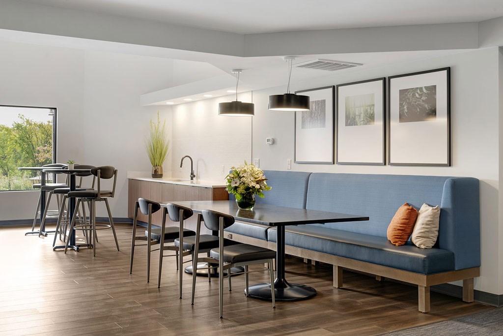 Resident lounge with seating and buffet counter