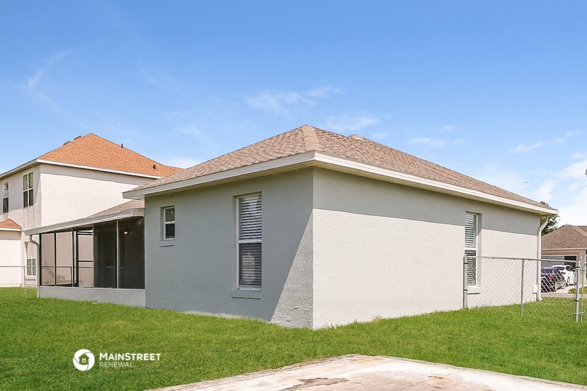 a view of a house from the back yard