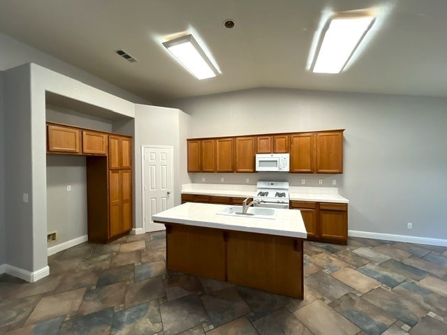 A kitchen with wooden cabinets and a white countertop.