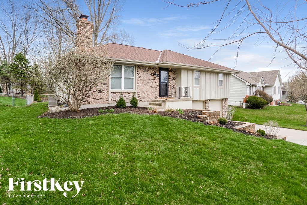 a home with green grass and a lawn