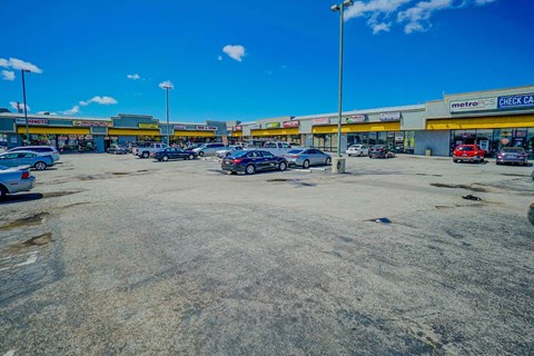 the parking lot is empty in front of a gas station