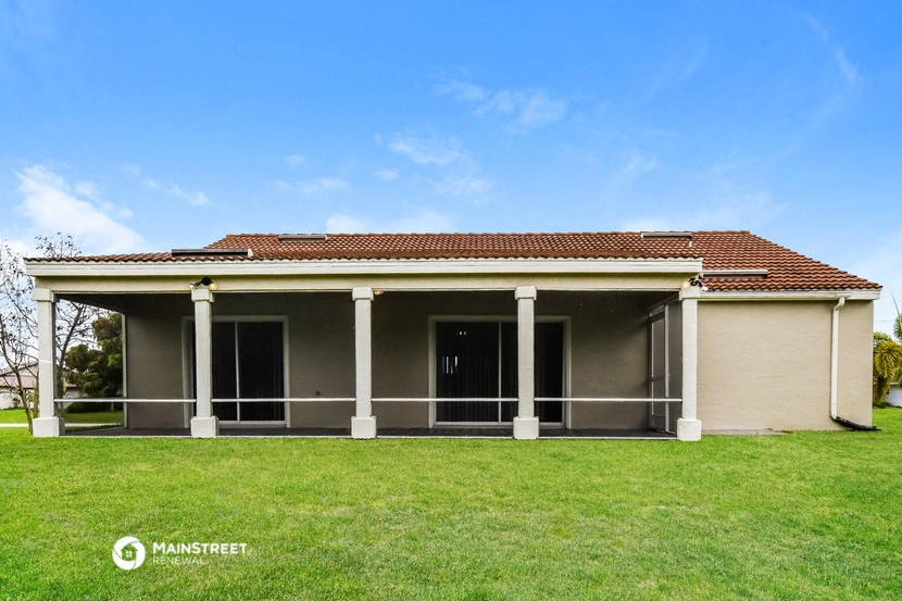 a house with a lawn in front of it