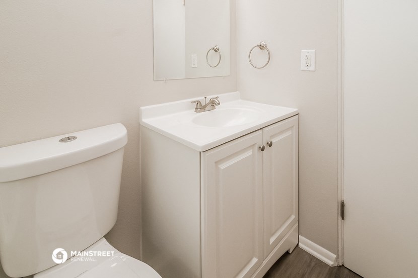 a bathroom with a sink and a toilet