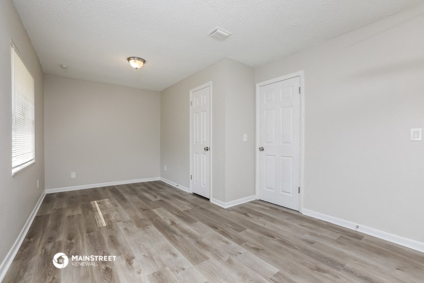 the spacious living room of our two bedroom apartment at university heights affordable housing