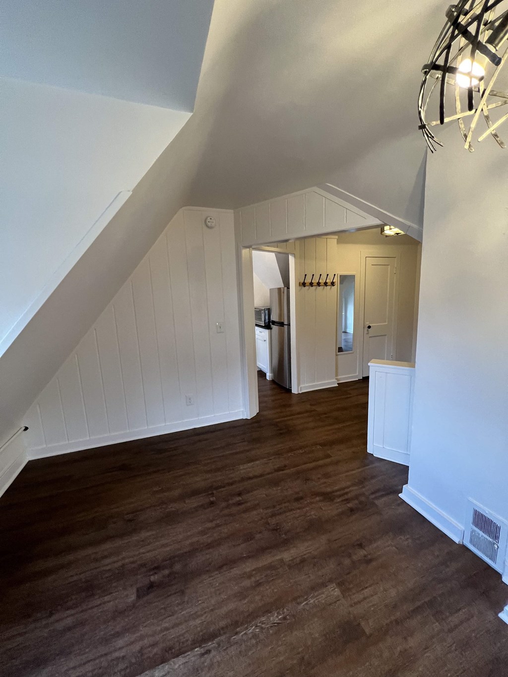 a view from the loft into the kitchen and living room