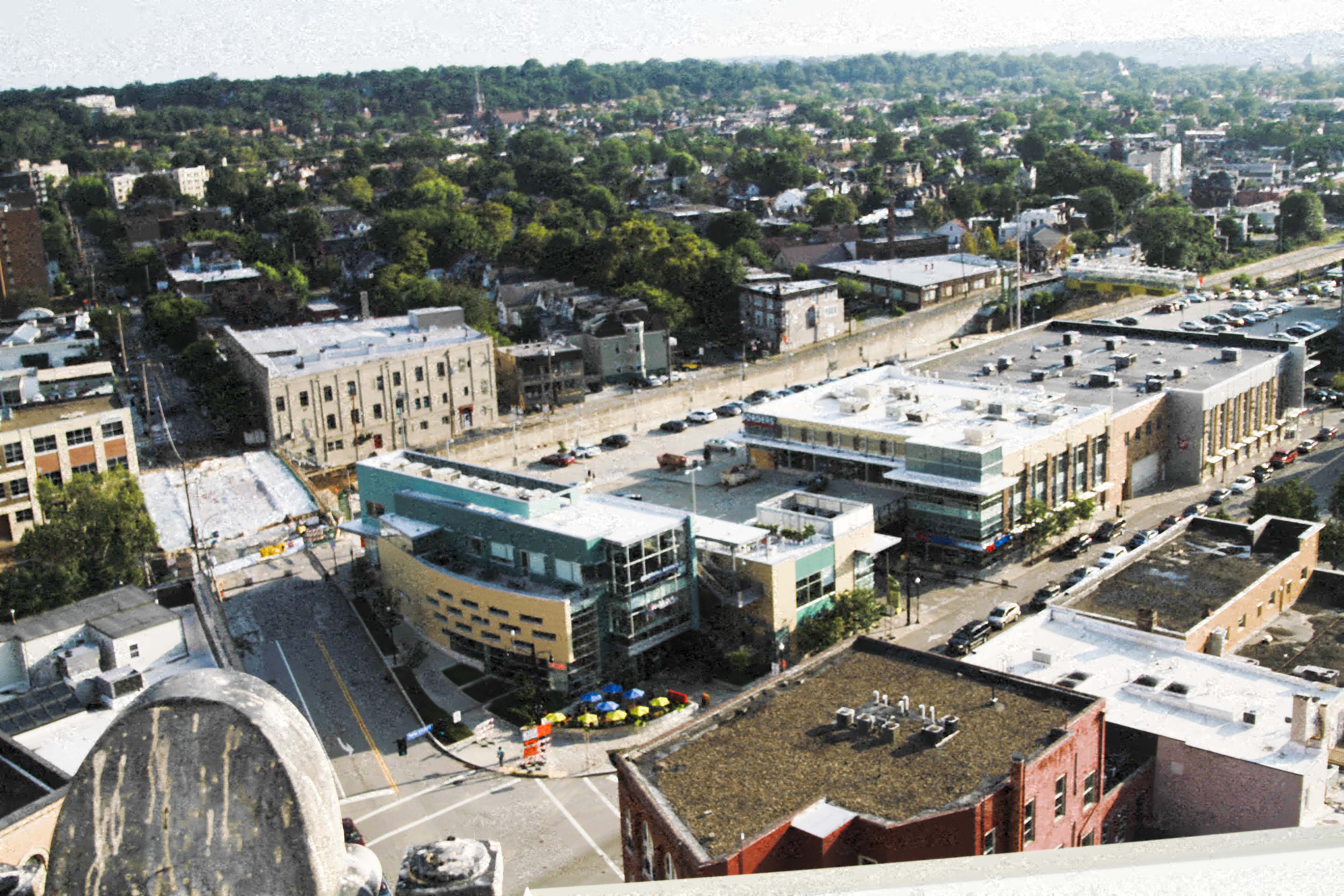 a view of the city from the roof of a building
