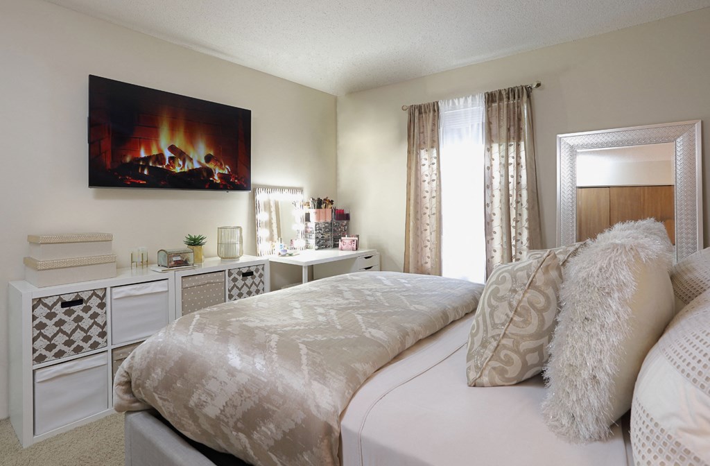 Master bedroom with walk-in closet and 9-foot ceilings at Claremont Apartments in Minnetonka, Minnesota