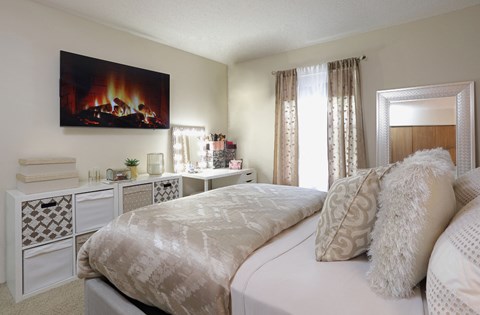 Master bedroom with walk-in closet and 9-foot ceilings at Claremont Apartments in Minnetonka, Minnesota