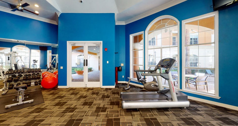 Luxury apartments with 24-hour fitness center at Tuscany Court Apartments in Houston.