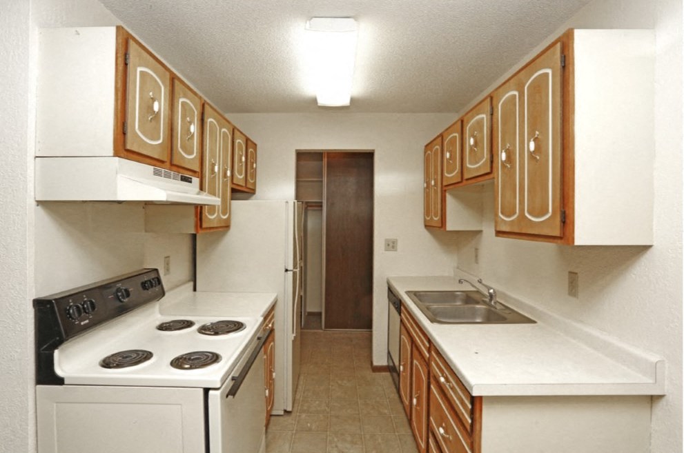 Kitchen with light brown cupboards