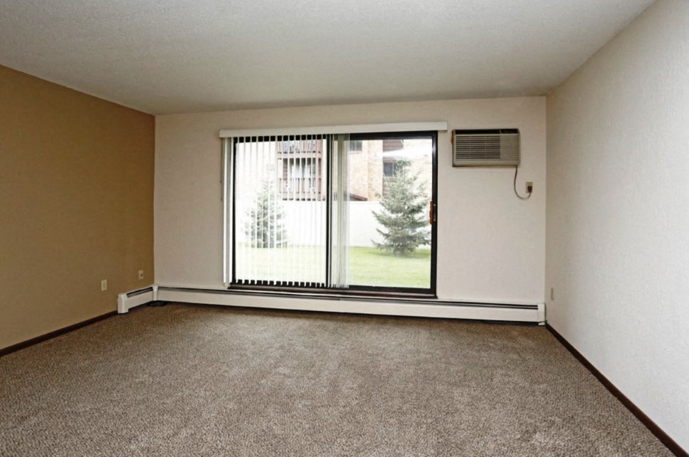 Living room area with walk out patio