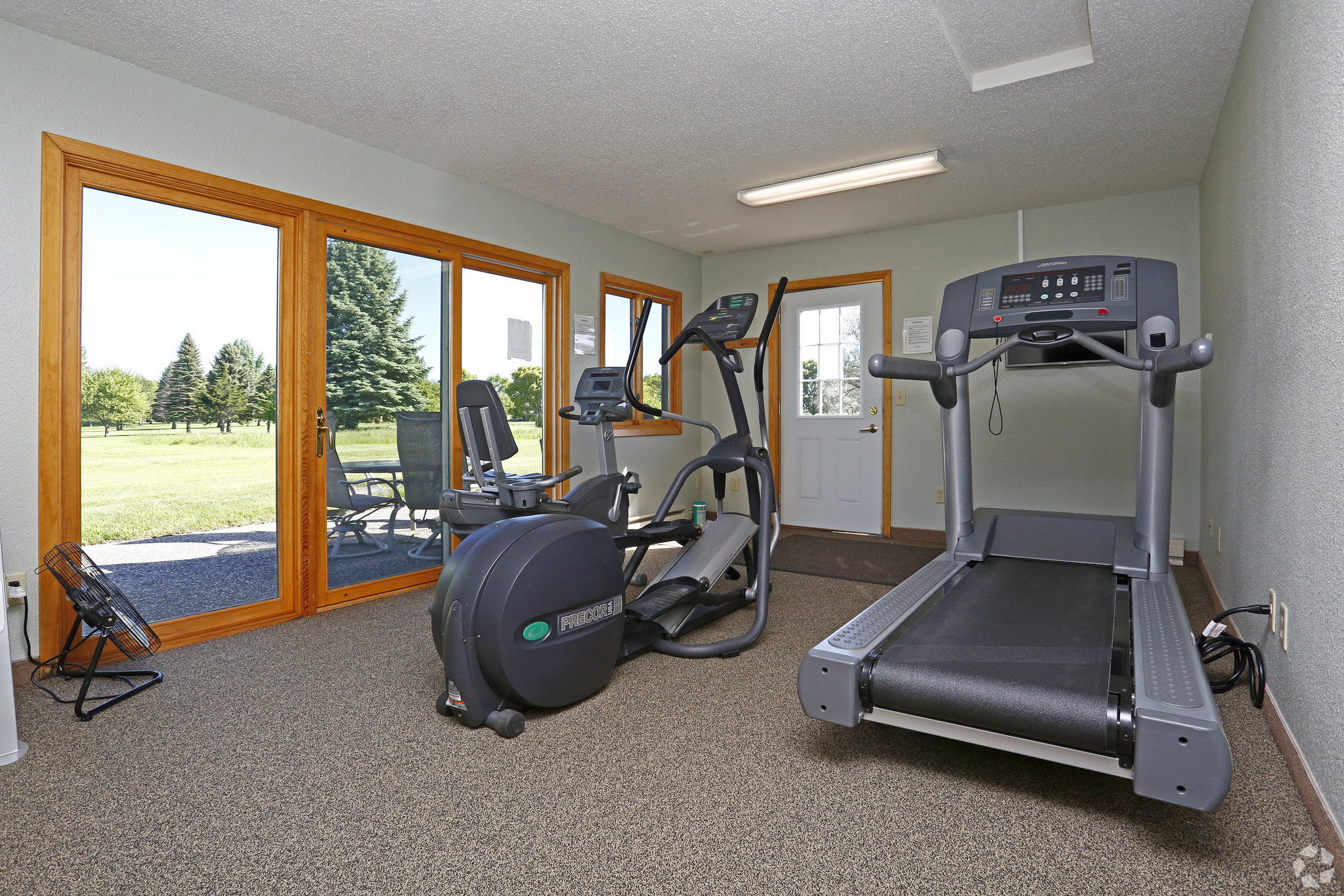 Fitness room with bike and treadmill