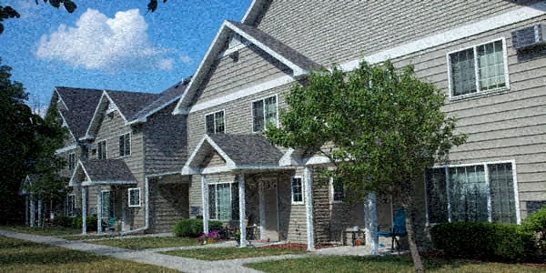 a house with a tree in front of it
