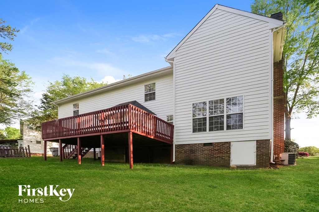 a deck on the side of a house
