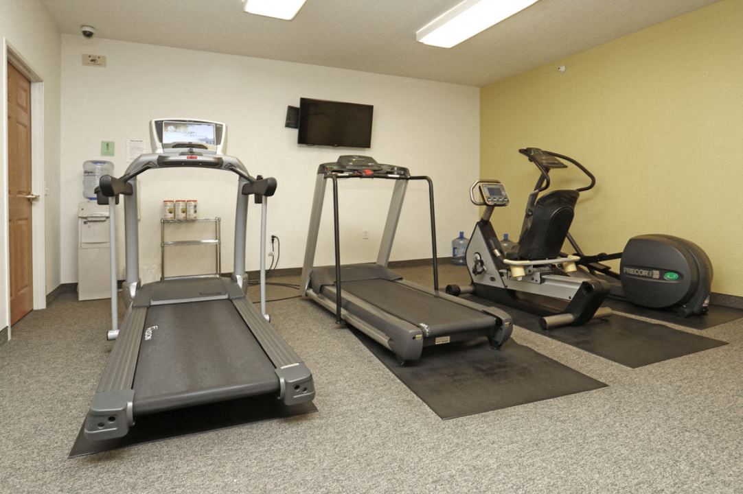 the gym in our new building is equipped with equipment for exercise