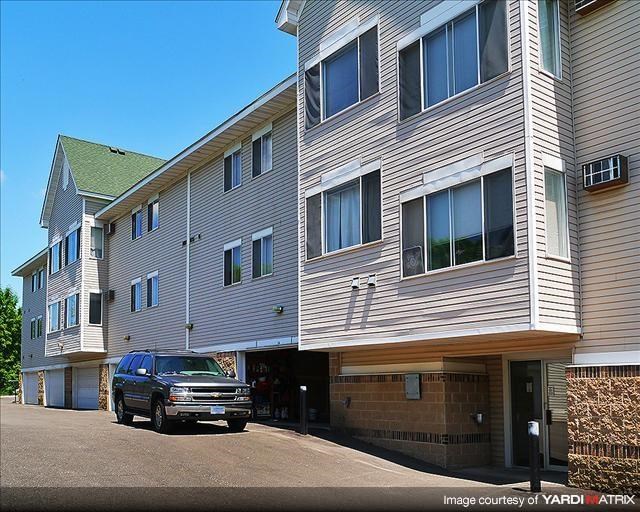 a truck parked in front of a building