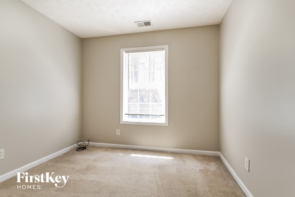 a empty room with a window in it