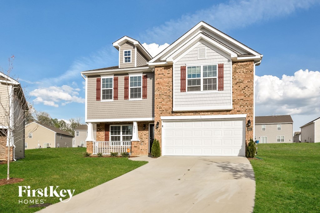 A house with a garage is for sale by FirstKey Homes.