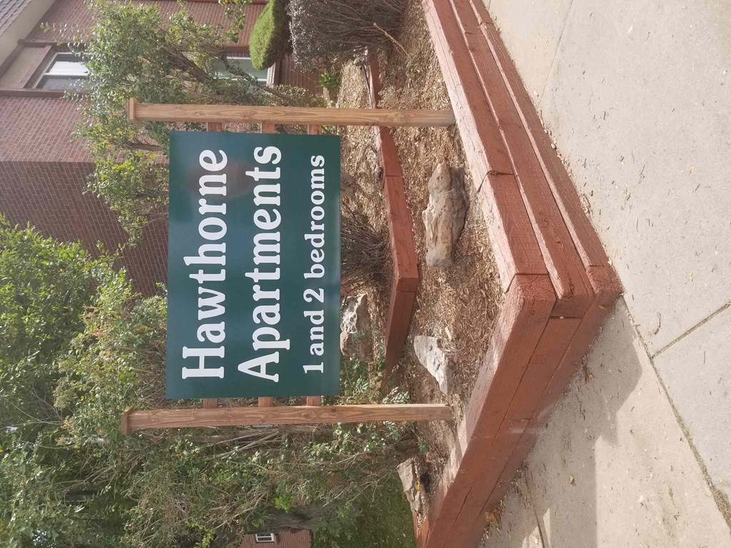 a sign that is on the side of a building