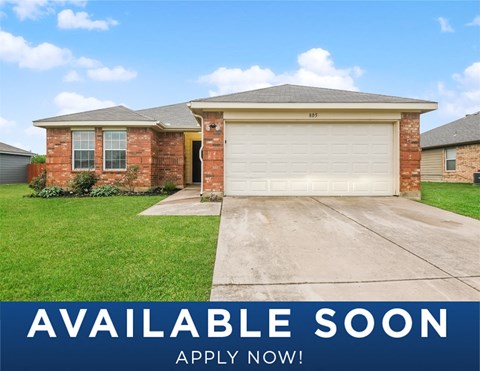 a house with a driveway and a garage door