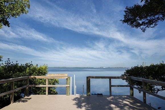 a view of a body of water from a deck