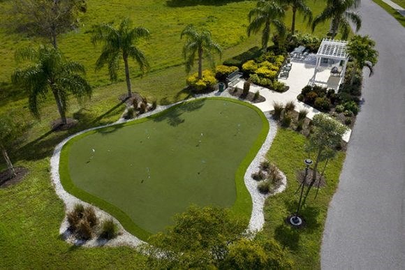 an aerial view of a golf course in a garden