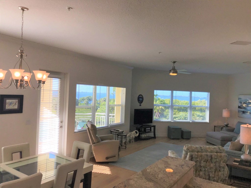 a view of the living room and dining room from the kitchen