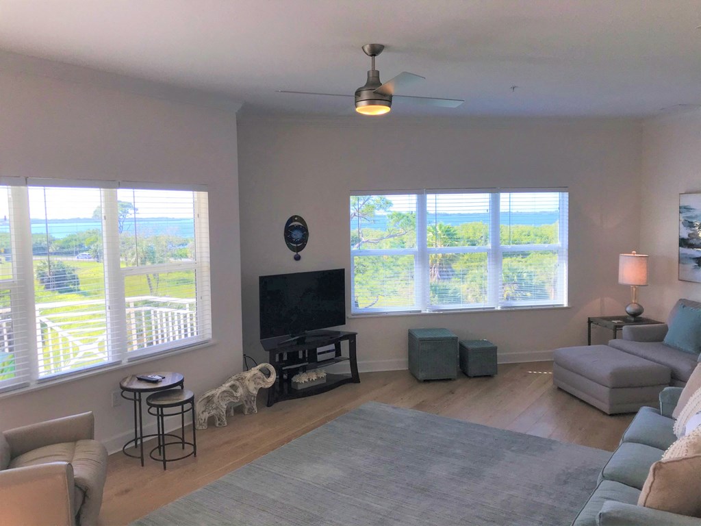 a living room with a couch and a tv