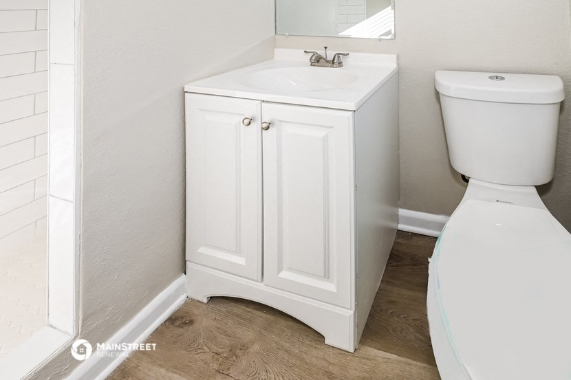 a small bathroom with a toilet and a sink