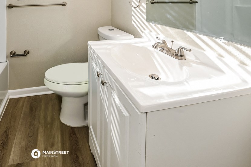 a bathroom with a sink and a toilet