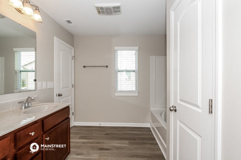 the master bathroom is clean and ready to be remodeled