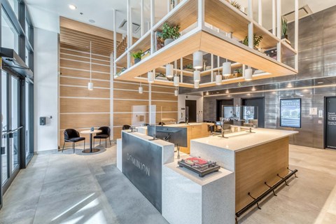 A reception area with a counter and chairs is visible.