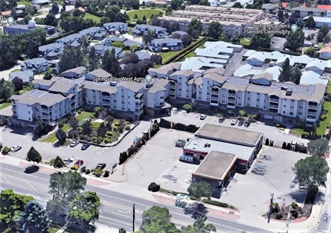 an aerial view of an apartment complex in the city