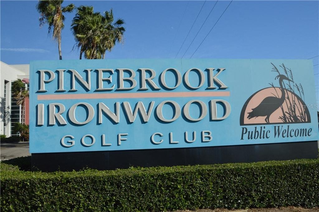 a sign for the pine brook ironwood golf club
