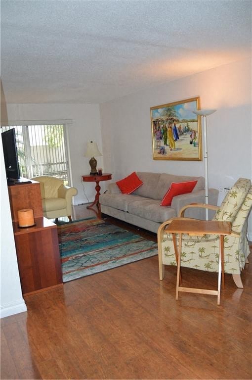 a living room with a couch and a chair