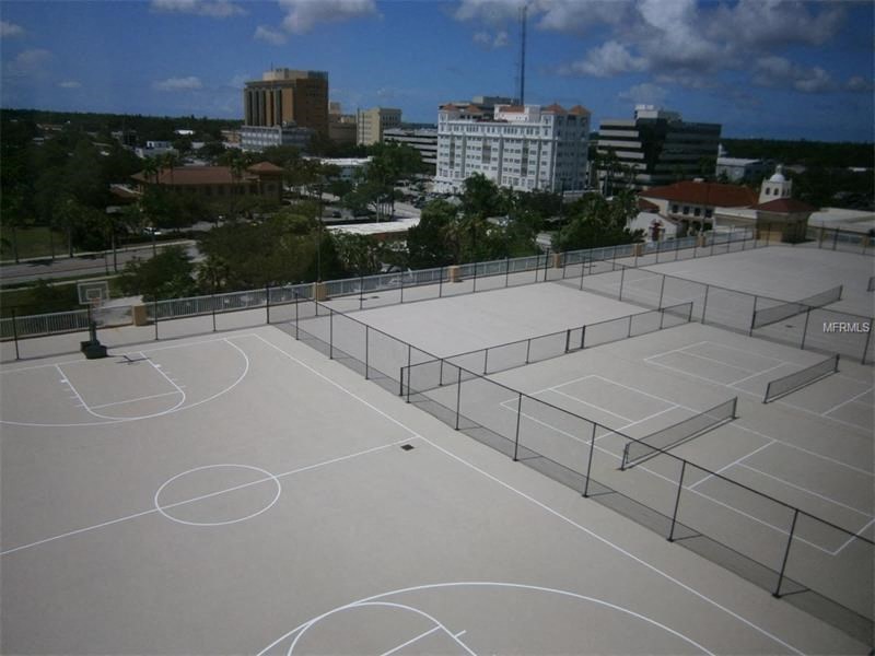 a tennis court on the roof of a building
